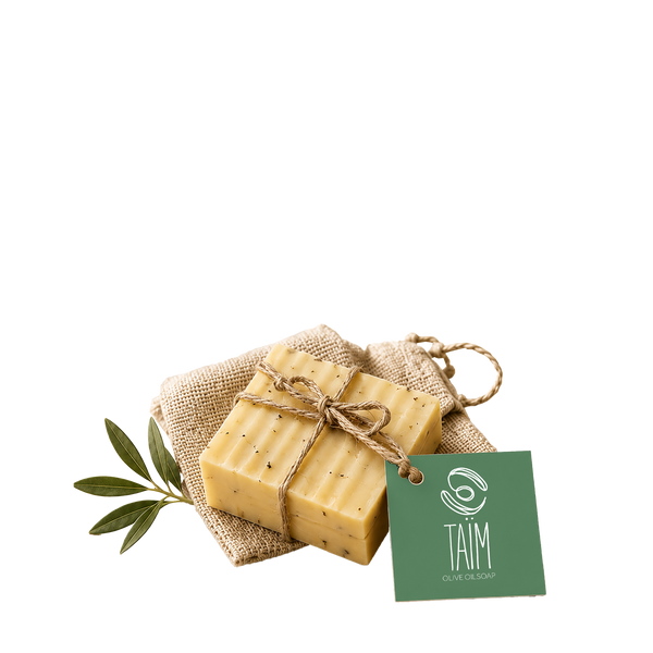 bars of soap tied with twine on a burlap bag with an olive leaf, accompanied by a 'Taim' card on a white background.